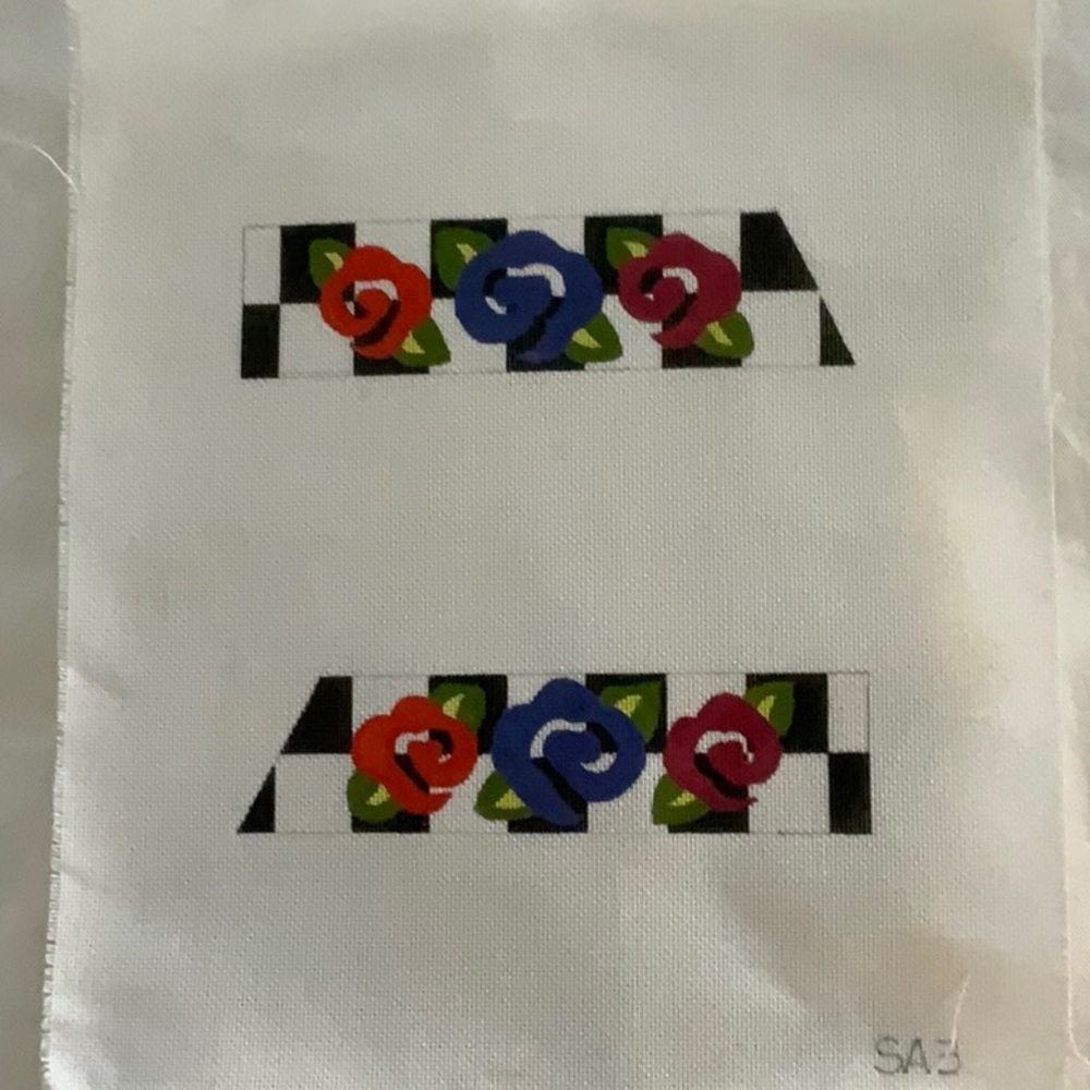 Flower needlepoint canvas to finish into slide sandals or two key fobs.